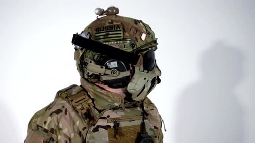 Camouflaged Soldier Holding Rifle Ready For War