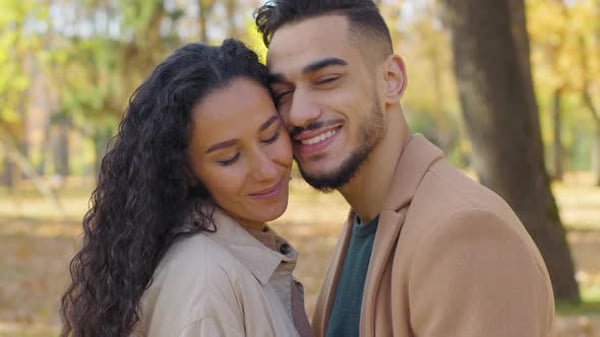 Closeup Hispanic Couple Cuddling Hugging Embracing in Autumnal Fall ...
