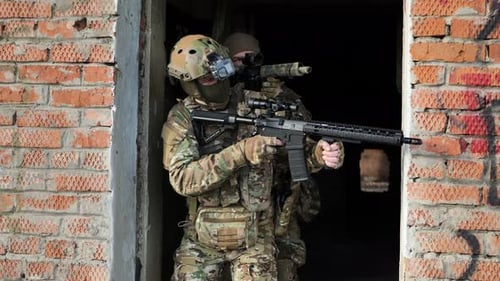 Special Forces Soldiers with Weapons Take Part in Military Operations