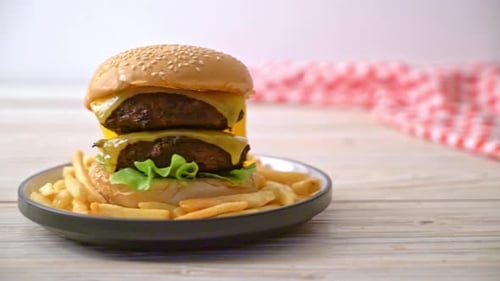 Double Cheeseburger on Plate with French Fries