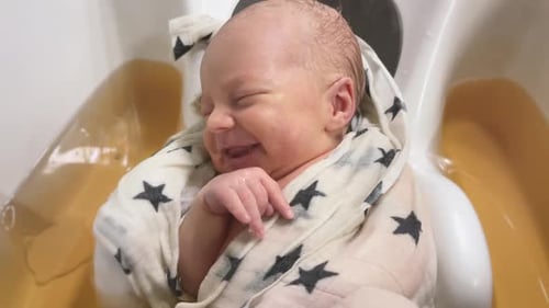 Newborn Baby in Bath