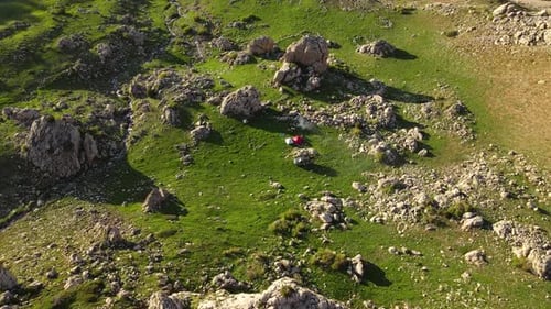 Aerial view of the team camping in the plateau with a drone camera