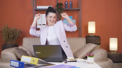 Home office worker young woman dance and work.