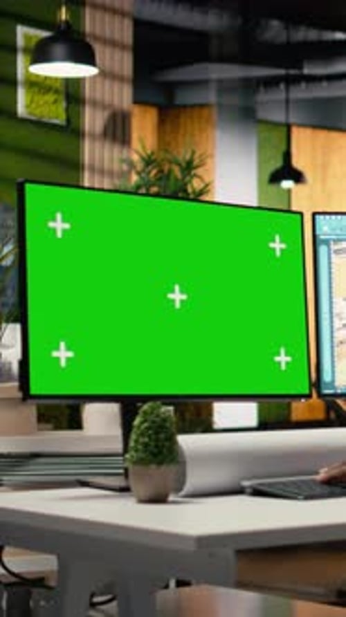 Vertical Video Black Engineer Works on Floor Plan Design with a Mockup Display