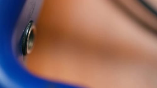 Inserting Audio Jack into Blue Electric Guitar Macro