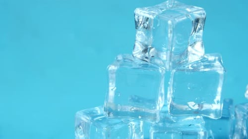 Close Up of Many Ice Cubes on White Background