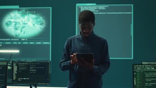 Man Uses Tablet in Futuristic Office with World Map