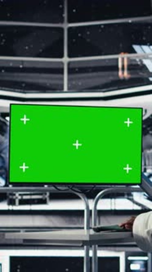 Vertical Video Astronaut Looking at Planet Visualization Before Stepping Out of Space Station