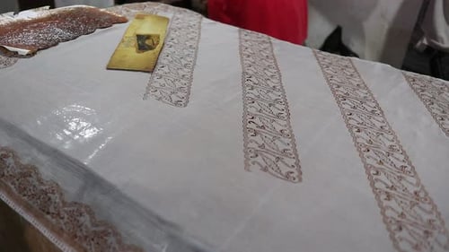 Textile Worker Applying Wax for Batik Pattern