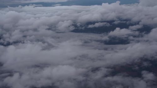 Fluffy White Clouds Drifting in the Sky