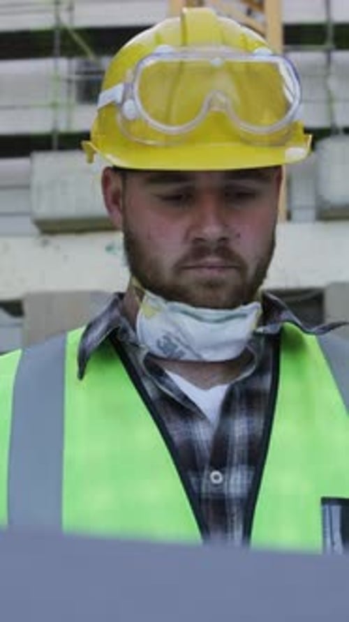 Paper, reading or man on construction site for inspection, review building plan