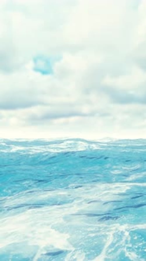 Breathtaking View of a Turquoise Sea with Crystal-Clear Water, Fluffy White Clouds Floating