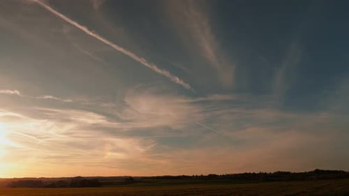 Dramatic Sunset Sky Over Rural Fields