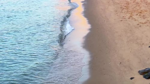 Calm Ocean Waves Gently Reaching Sandy Beach Shore | 4K Coastal Relaxation Scene