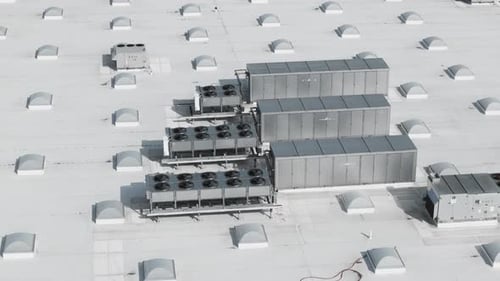 HVAC Units on Commercial Building Rooftop Aerial View