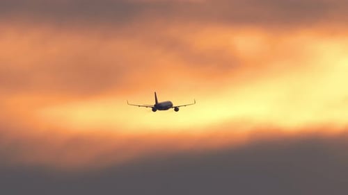 Shot of Jet Plane in Sunset Sky