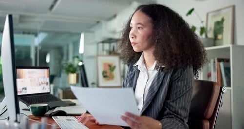 Computer, finance and paper with business woman typing in office for budget or wealth management