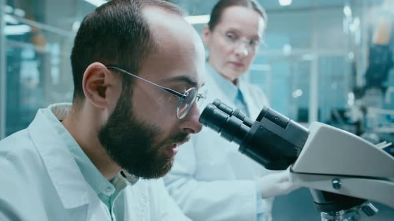 Scientists Working With Microscope in Laboratory, Science Stock Footage ...