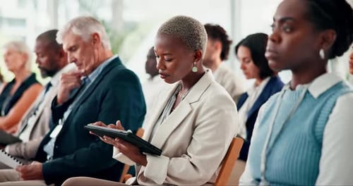 Business, learning and woman with tablet at seminar typing notes and information from workshop