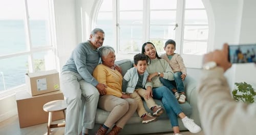 Happy Family Poses for Photo in Sunny Home