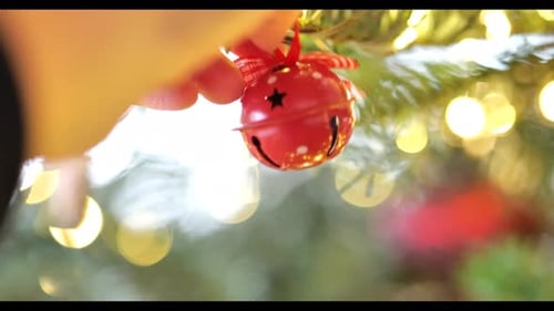 Bells for the Christmas tree.White and red Christmas bells close-up.