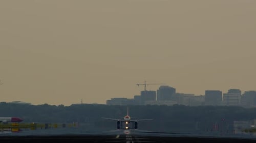Airplane Taking Off from Airport Runway