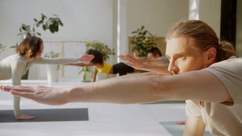 Multiracial Friends Having Group Yoga Session at Studio