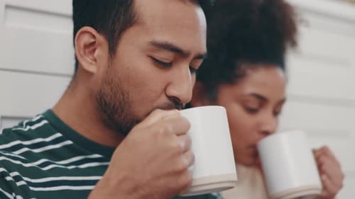 Happy Couple Enjoying Coffee Together Indoors