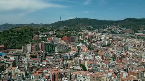 A cinematic slow-motion aerial drone shots of the Barcelona community with the Pyrenees landscape