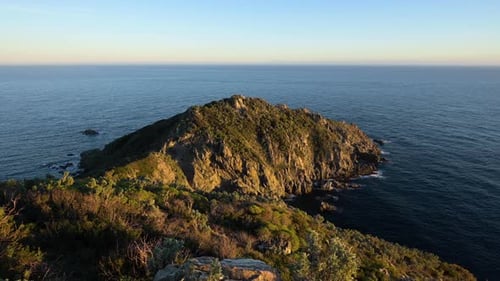 The pristine Mediterranean mountains by the sea in the French Riviera during sunset - wide shot