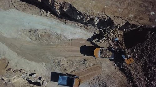 Loading of Stone Into Truck Excavator at Work Quarry Mining