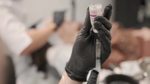 Filling a Syringe From a Ampoules of Medication