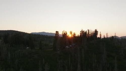 Aerial view of forest with tents, United States.