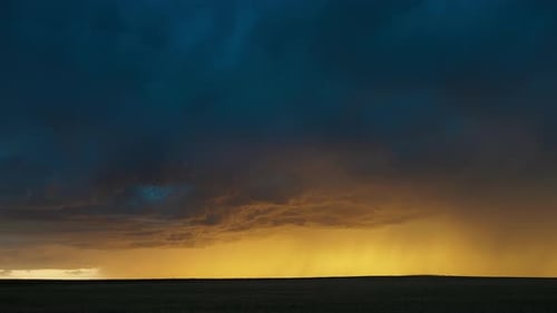 Dramatic storm clouds and vivid sunset sky