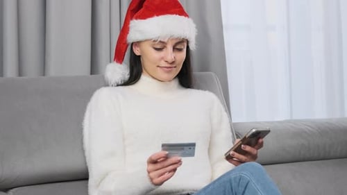 Woman Christmas Shopping Online with Smartphone