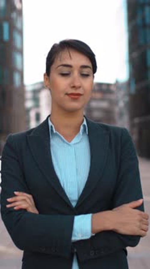 Confident Businesswoman Smiling in an Urban Setting