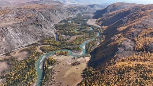 Meandering river in a scenic autumn mountain valley