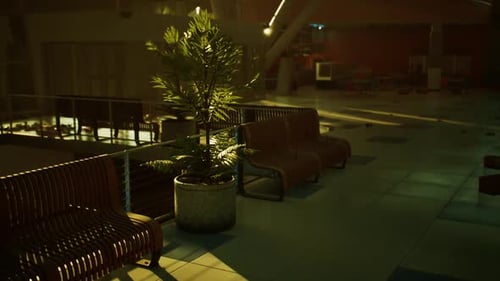 Abandoned Airport Terminal with Overgrown Plants and Empty Seating at Dusk