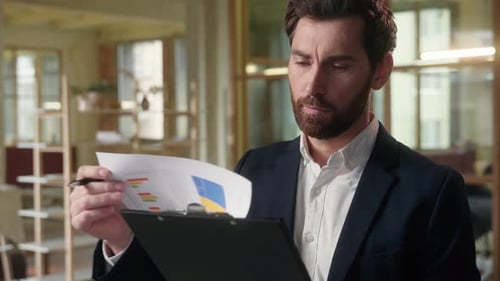 Business Man Thoughtful Guy Reading Documents in Office Deal Contract Sign Businessman Caucasian