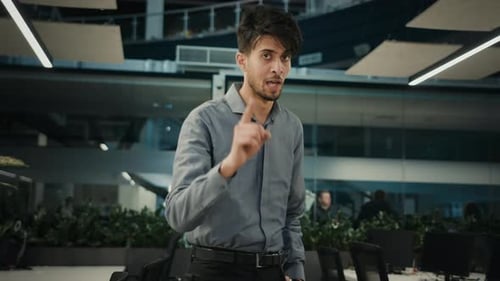 Indian Arabian Man Adult Businessman Showing Direction with Forefinger Put Index Finger in Front