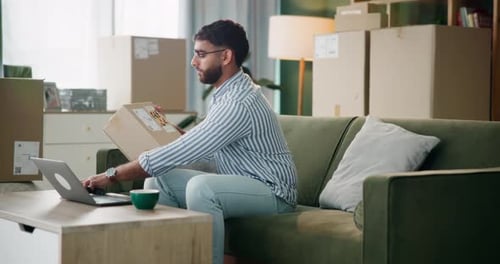 Person Scanning Packages While Working From Home