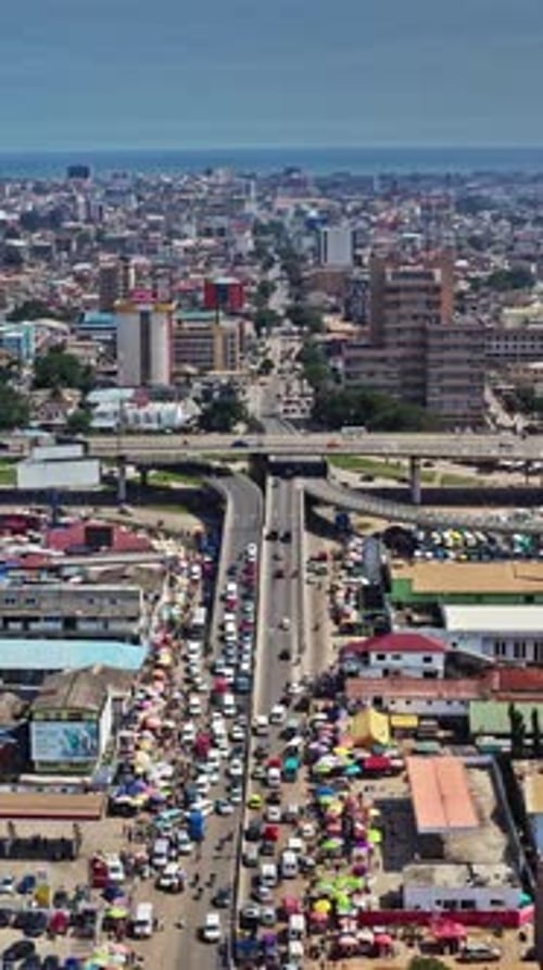 Vibrant aerial view of Accra showcasing urban life and bustling markets