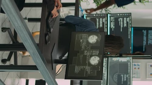 Vertical Video Diverse Team of Artificial Intelligence Cloud Programers Being Hacked