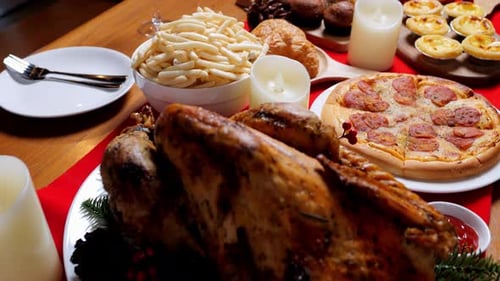 Christmas dinner with roasted turkey, food on table in dinning room for Christmas dinner celebration