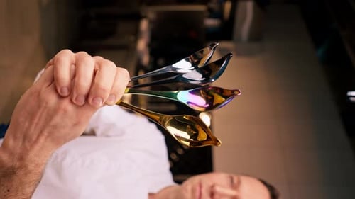 Elegant Metallic Spoons: Gold, Iridescent, and Silver Reflections