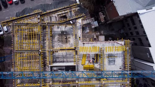 Workers And Crane On The Building Construction