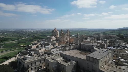 Aerial video of the walled city of St Paul's Cathedral, Malta