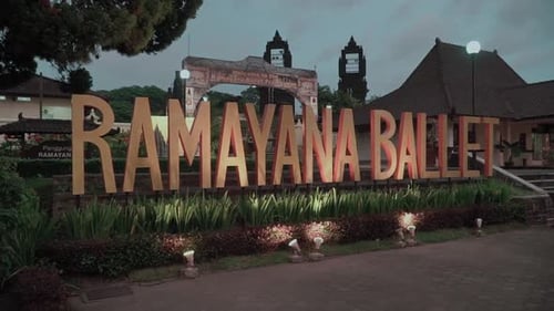 Colorful wide banner sign displaying text for the Ramayana Ballet performance at an outdoor theater