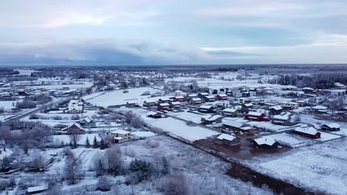 Snow Covered Village in Winter Aerial View