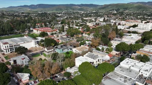 Drone aerial of Cerro San Luis Obispo near Highway 101 in San Luis Obispo, CA, highlighting rugged